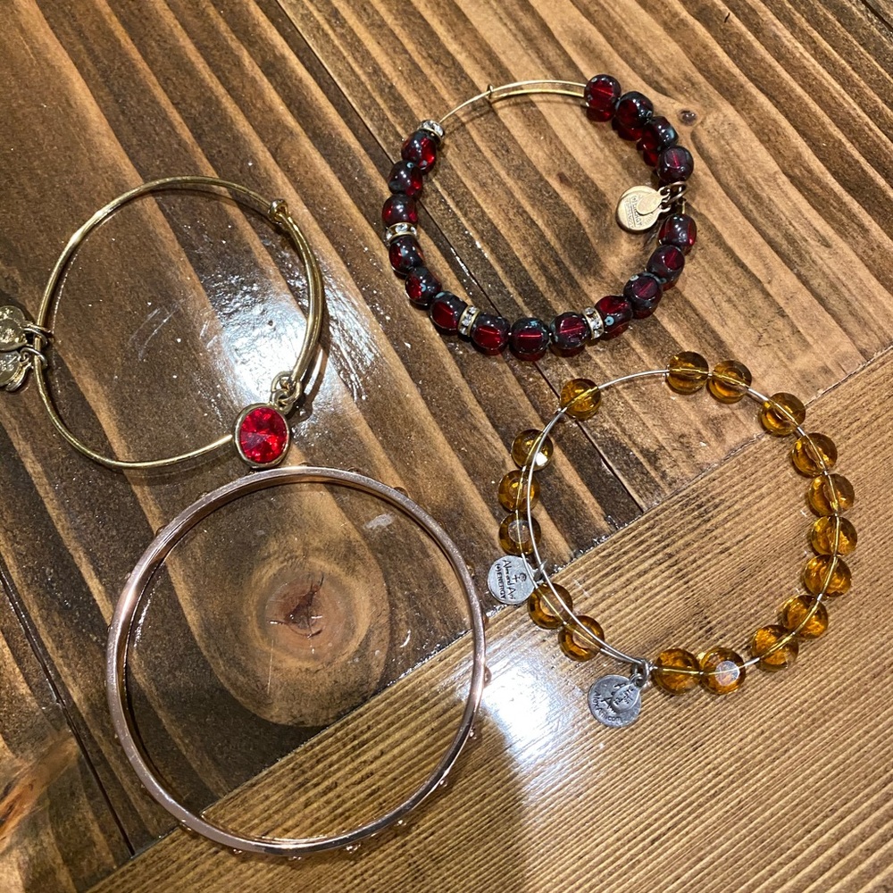 4 bracelets three or Alex & Ani  1 is Kate spade
